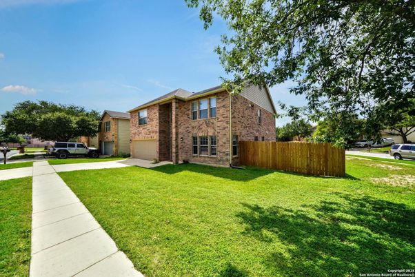 Attached, Backyard, Exterior, Facade, Brick Facade, None