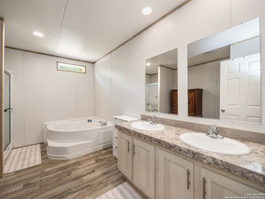 Bathroom, Dual Sink Vanities, Interior, Recessed Lighting, Wood Texture Flooring