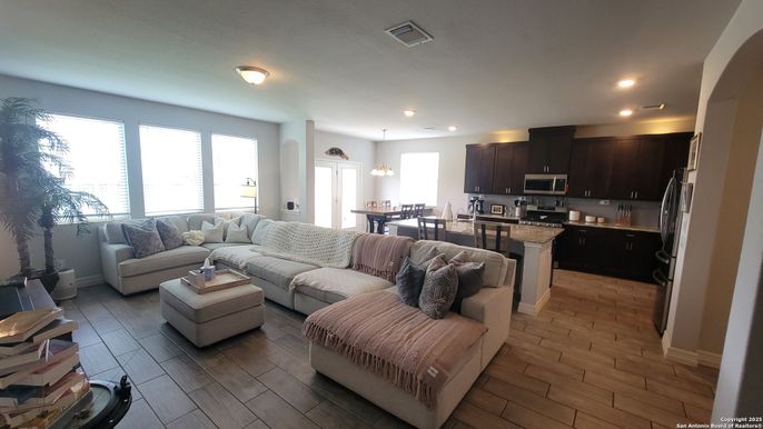 Dining room, Interior, Kitchen, Living room, Pendant Lights, Recessed Lighting, Stainless Steel Appliances, Wood Texture Flooring
