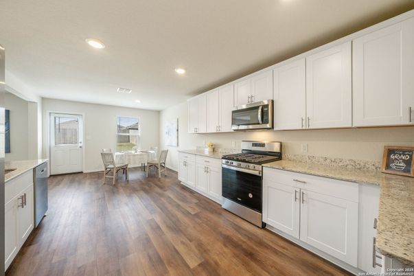 Dining room, Interior, Kitchen, Recessed Lighting, Stainless Steel Appliances, Wood Texture Flooring