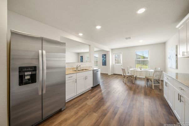 Dining room, Interior, Kitchen, Recessed Lighting, Stainless Steel Appliances, Wood Texture Flooring