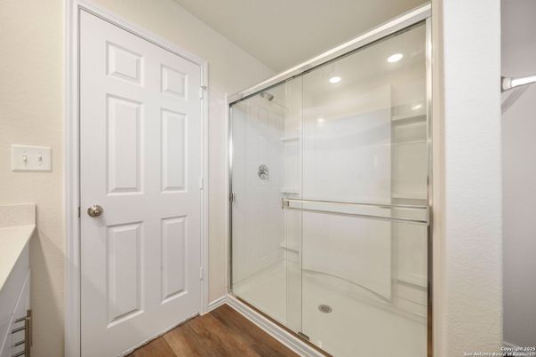 Bathroom, Glass Shower, Interior, Recessed Lighting, Wood Texture Flooring
