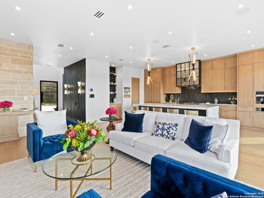 Interior, Kitchen, Living room, Pendant Lights, Recessed Lighting, Stainless Steel Appliances, Stone Walls, Wood Texture Flooring
