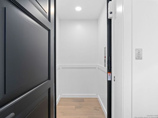 Elevator, Interior, Recessed Lighting, Wood Texture Flooring