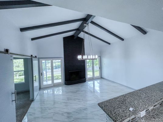 Empty room, Fireplace, Interior, Marble, Pendant Lights, Wooden Beams