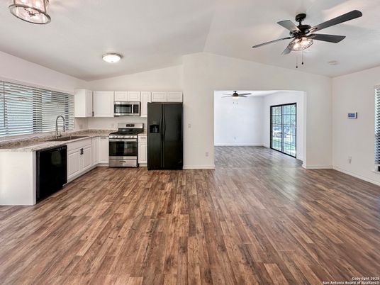 Empty room, Interior, Kitchen, Stainless Steel Appliances, Wood Texture Flooring
