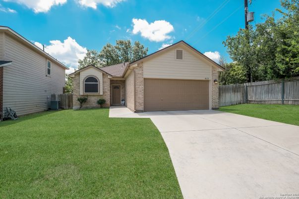 Attached, Backyard, Exterior, Facade, Brick Facade, Ranch