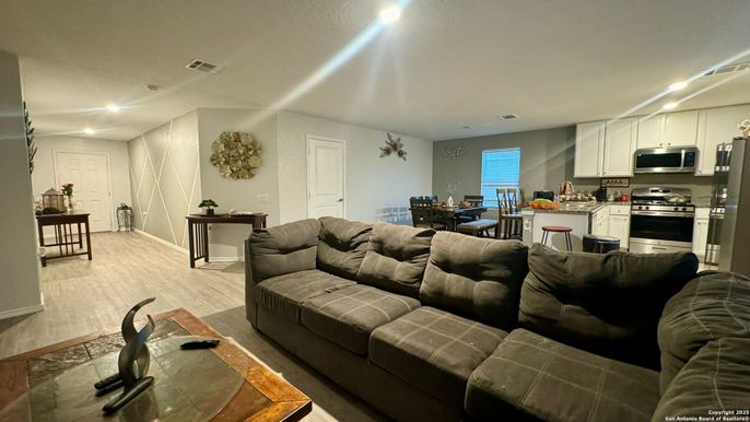 Dining room, Interior, Kitchen, Living room, Recessed Lighting, Stainless Steel Appliances, Wood Texture Flooring