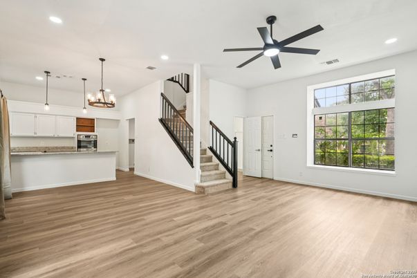 Chandelier, Interior, Kitchen, Pendant Lights, Recessed Lighting, Stainless Steel Appliances, Wood Texture Flooring