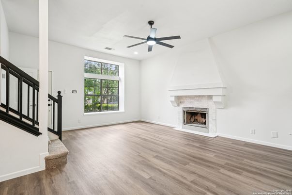 Empty room, Fireplace, Interior, Recessed Lighting, Wood Texture Flooring