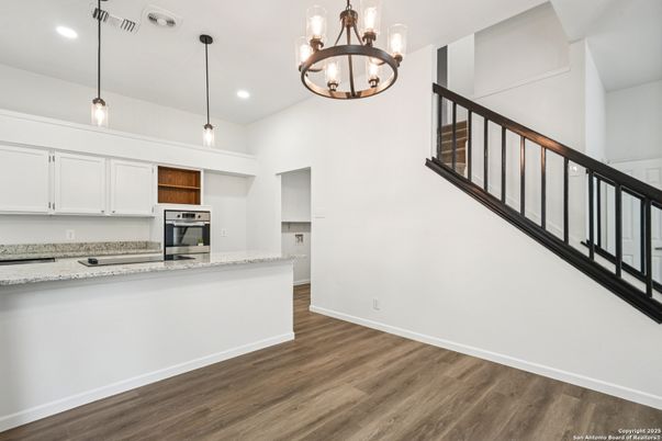 Interior, Kitchen, Pendant Lights, Recessed Lighting, Stainless Steel Appliances, Wood Texture Flooring