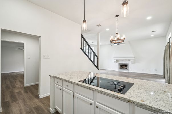 Chandelier, Fireplace, Interior, Pendant Lights, Recessed Lighting, Wood Texture Flooring