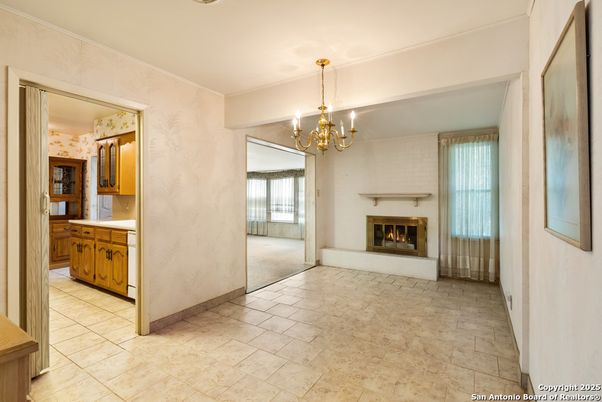 Chandelier, Empty room, Fireplace, Interior