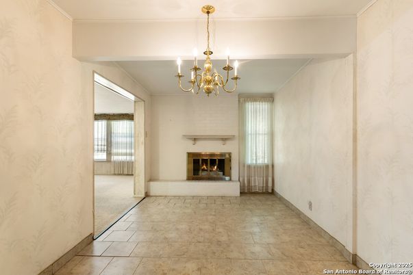 Chandelier, Empty room, Fireplace, Interior