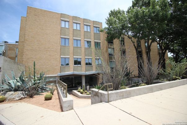 Exterior, Facade, Brick Facade, Condo Building