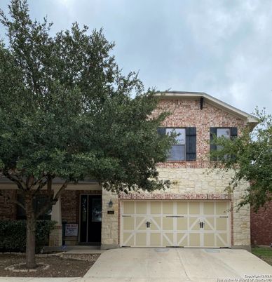 Attached, Exterior, Facade, Brick Facade, None
