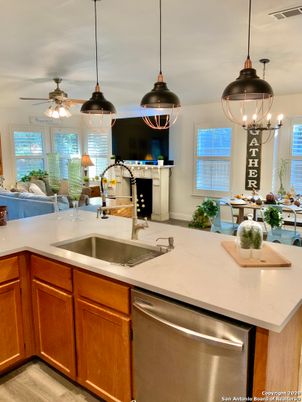 Fireplace, Interior, Kitchen, Pendant Lights, Stainless Steel Appliances, Wood Texture Flooring
