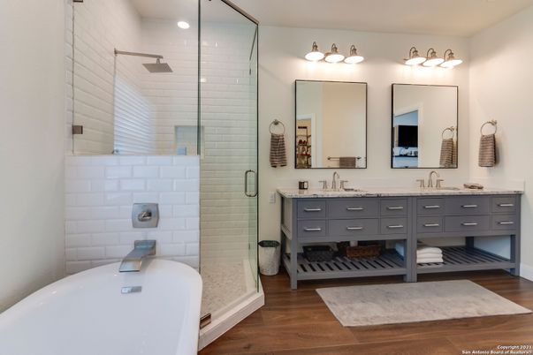 Bathroom, Dual Sink Vanities, Glass Shower, Interior, Recessed Lighting, Wood Texture Flooring