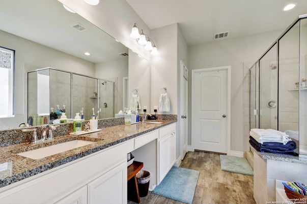 Bathroom, Dual Sink Vanities, Glass Shower, Interior, Recessed Lighting, Wood Texture Flooring