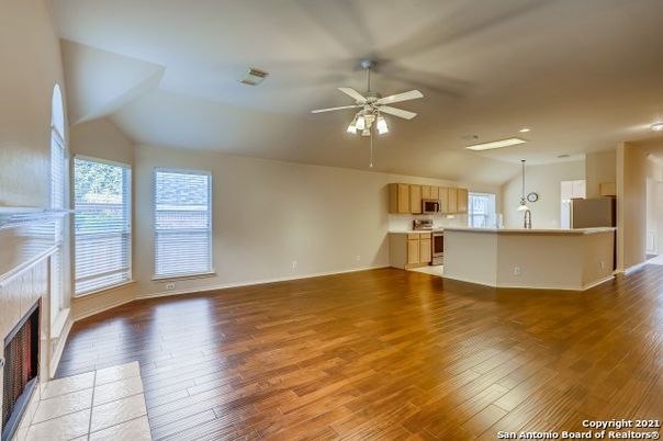Empty room, Fireplace, Interior, Kitchen, Recessed Lighting, Wood Texture Flooring