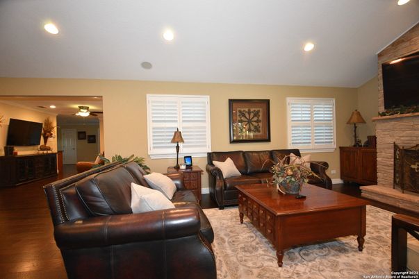 Fireplace, Interior, Living room, Recessed Lighting, Wood Texture Flooring