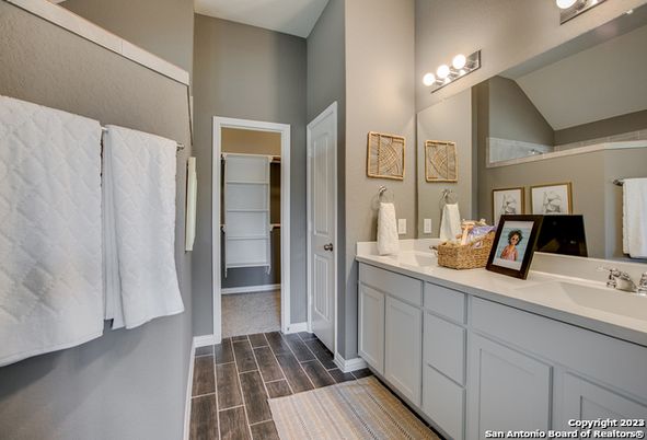 Bathroom, Dual Sink Vanities, Interior, Walk-in Closets, Wood Texture Flooring