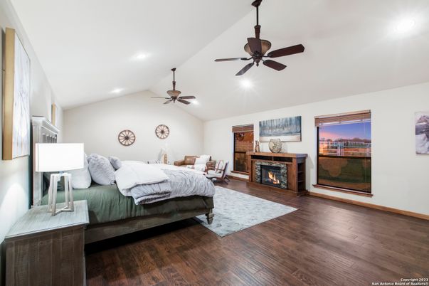 Bedroom, Fireplace, Interior, Recessed Lighting, Wood Texture Flooring