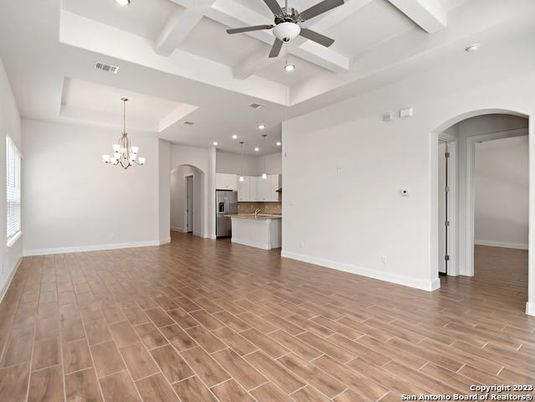 Chandelier, Empty room, Interior, Kitchen, Recessed Lighting, Stainless Steel Appliances, Wood Texture Flooring