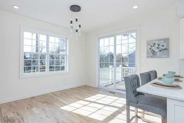 Dining room, Interior, Pendant Lights, Recessed Lighting, Wood Texture Flooring