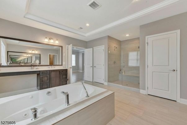 Bathroom, Dual Sink Vanities, Glass Shower, Interior, Recessed Lighting, Wood Texture Flooring