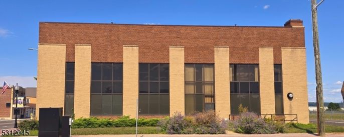 Exterior, Facade, Brick Facade, Condo Building