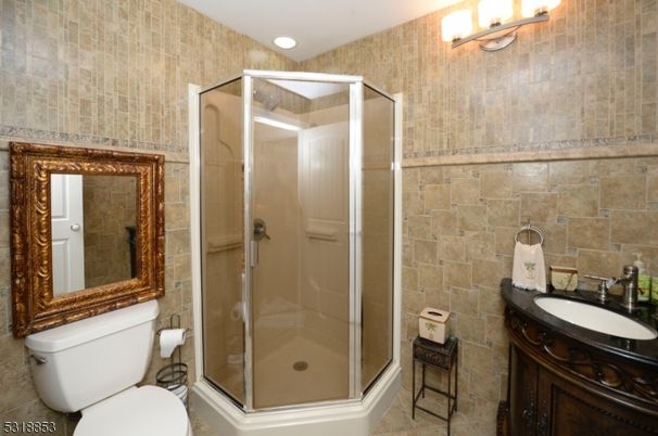 Bathroom, Glass Shower, Interior, Recessed Lighting, Stone Walls