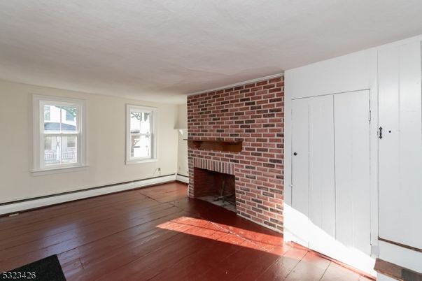 Empty room, Fireplace, Interior, Stone Walls, Wood Texture Flooring