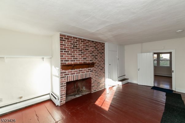 Empty room, Fireplace, Interior, Stone Walls, Wood Texture Flooring
