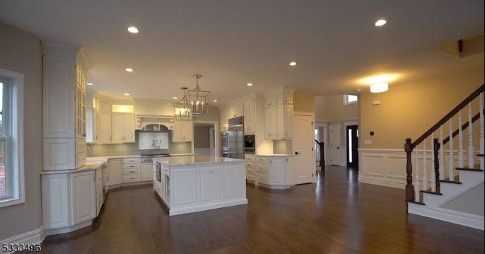 Chandelier, Interior, Kitchen, Pendant Lights, Recessed Lighting, Stainless Steel Appliances, Wood Texture Flooring