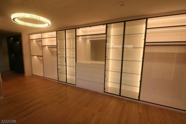Chandelier, Empty room, Interior, Pendant Lights, Recessed Lighting, Wood Texture Flooring