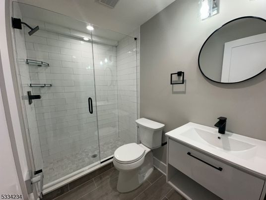 Bathroom, Glass Shower, Interior, Recessed Lighting, Wood Texture Flooring