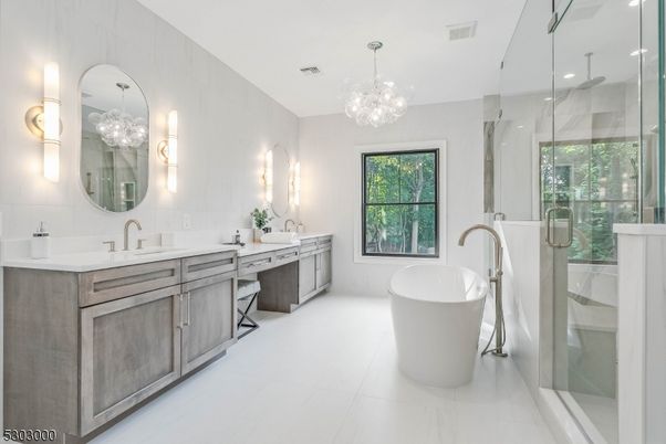Bathroom, Chandelier, Dual Sink Vanities, Free Standing Baths, Glass Shower, Interior, Pendant Lights