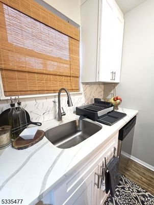 Interior, Kitchen, Tile Countertops, Wood Texture Flooring
