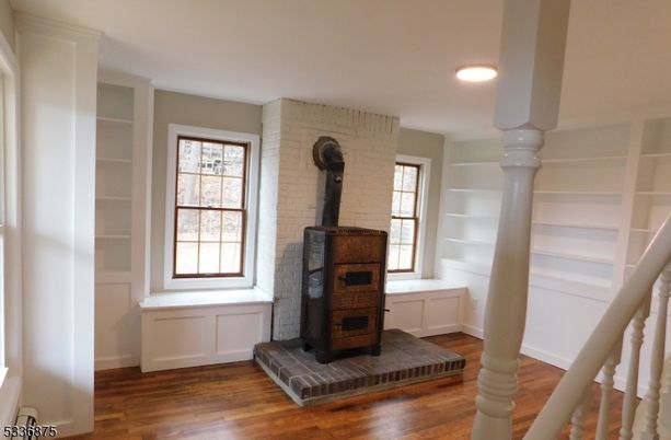 Fireplace, Interior, Recessed Lighting, Stone Walls, Wood Texture Flooring