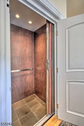 Elevator, Interior, Recessed Lighting, Wooden Walls