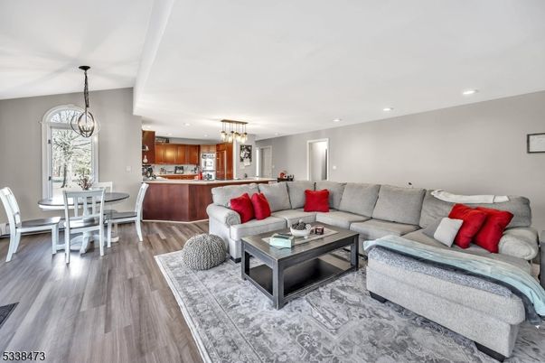 Chandelier, Dining room, Interior, Kitchen, Living room, Pendant Lights, Recessed Lighting, Wood Texture Flooring