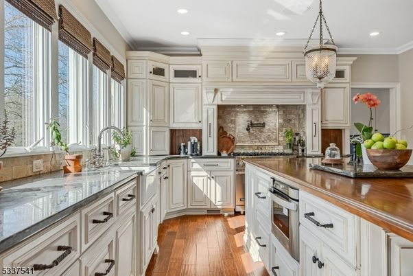 Interior, Kitchen, Pendant Lights, Recessed Lighting, Stainless Steel Appliances, Stone Walls, Wood Texture Flooring