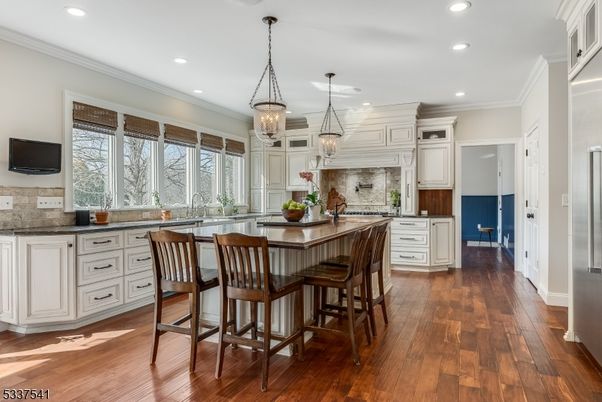 Chandelier, Interior, Kitchen, Pendant Lights, Recessed Lighting, Stainless Steel Appliances, Wood Texture Flooring