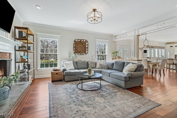 Chandelier, Dining room, Fireplace, Interior, Living room, Recessed Lighting, Wood Texture Flooring