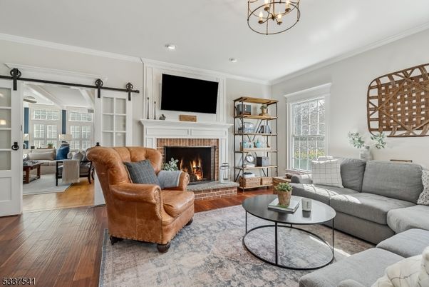 Chandelier, Fireplace, Interior, Living room, Recessed Lighting, Wood Texture Flooring