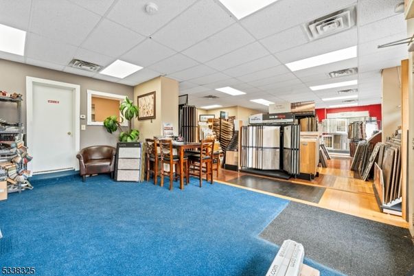 Dining room, Interior, Kitchen, Recessed Lighting, Stainless Steel Appliances, Wood Texture Flooring