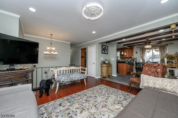 Chandelier, Dining room, Interior, Pendant Lights, Recessed Lighting, Wooden Beams, Wood Texture Flooring