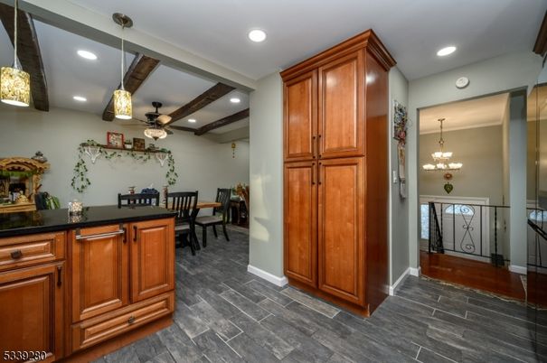Chandelier, Dining room, Interior, Recessed Lighting, Wooden Beams, Wood Texture Flooring