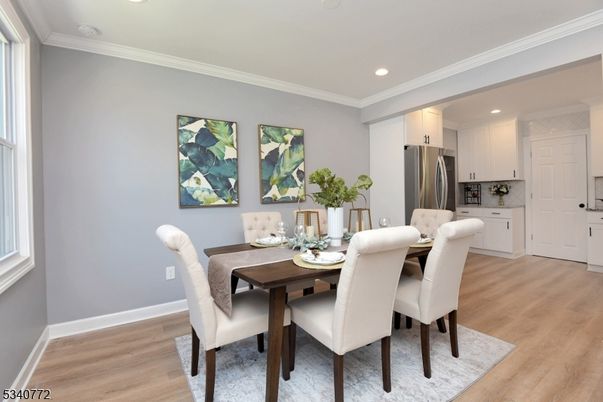 Dining room, Interior, Kitchen, Recessed Lighting, Stainless Steel Appliances, Wood Texture Flooring